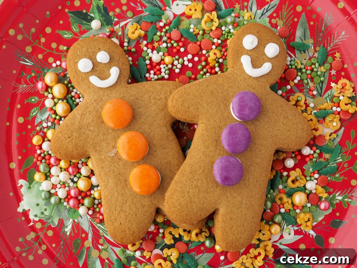 Vegan Gingerbread Recipe: Moist Spiced Loaf for Holidays 10 Gingerbread on a plate with Christmas sprinkles.