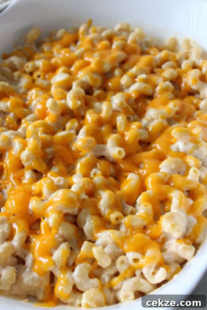 A close up shot of high protein mac and cheese in a casserole dish