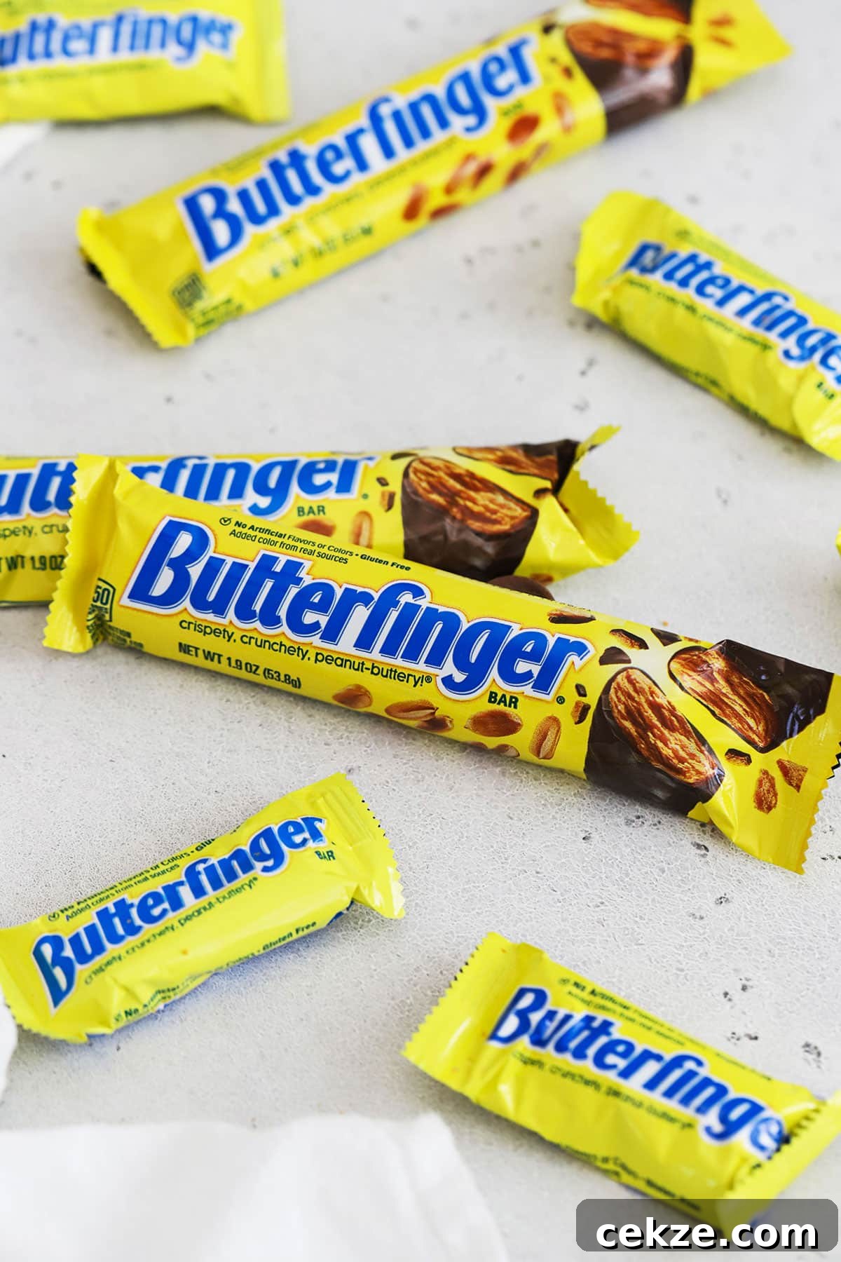 Are Butterfinger Candy Bars Gluten Free? 3 different sizes of Butterfinger candy bars on a white background