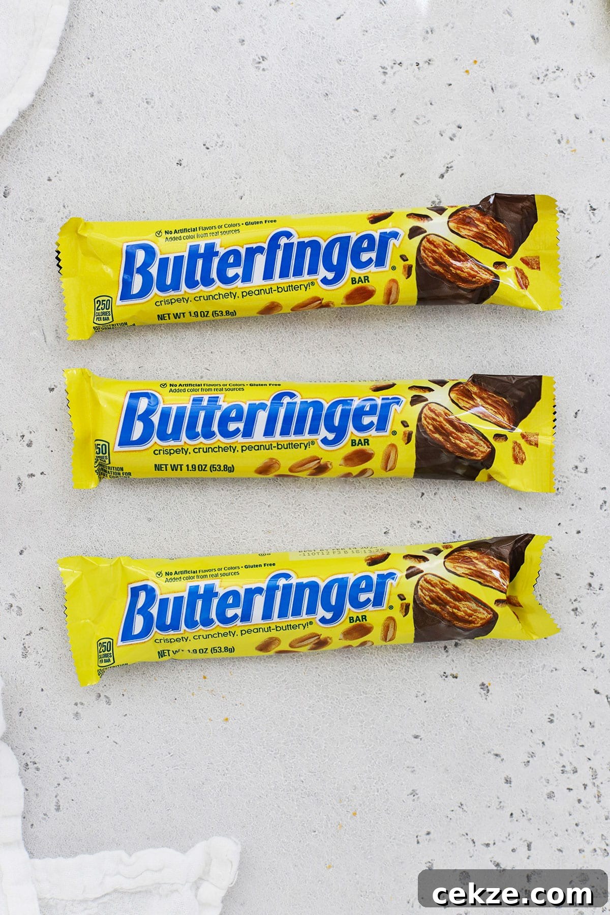 Are Butterfinger Candy Bars Gluten Free? 4 three sizes of Butterfinger candy bars on a white background