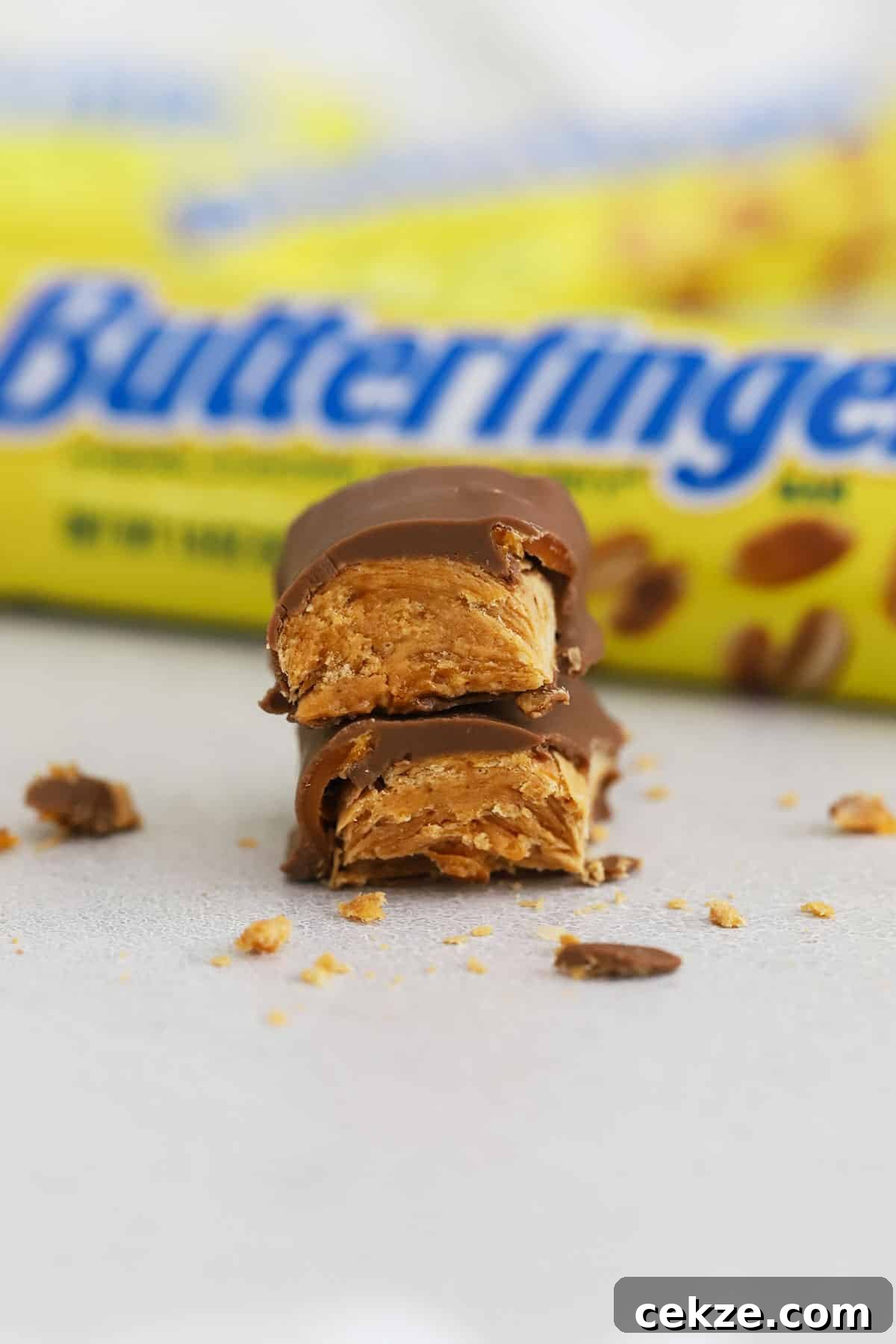 Are Butterfinger Candy Bars Gluten Free? 5 a butterfinger candy bar cut in half and stacked