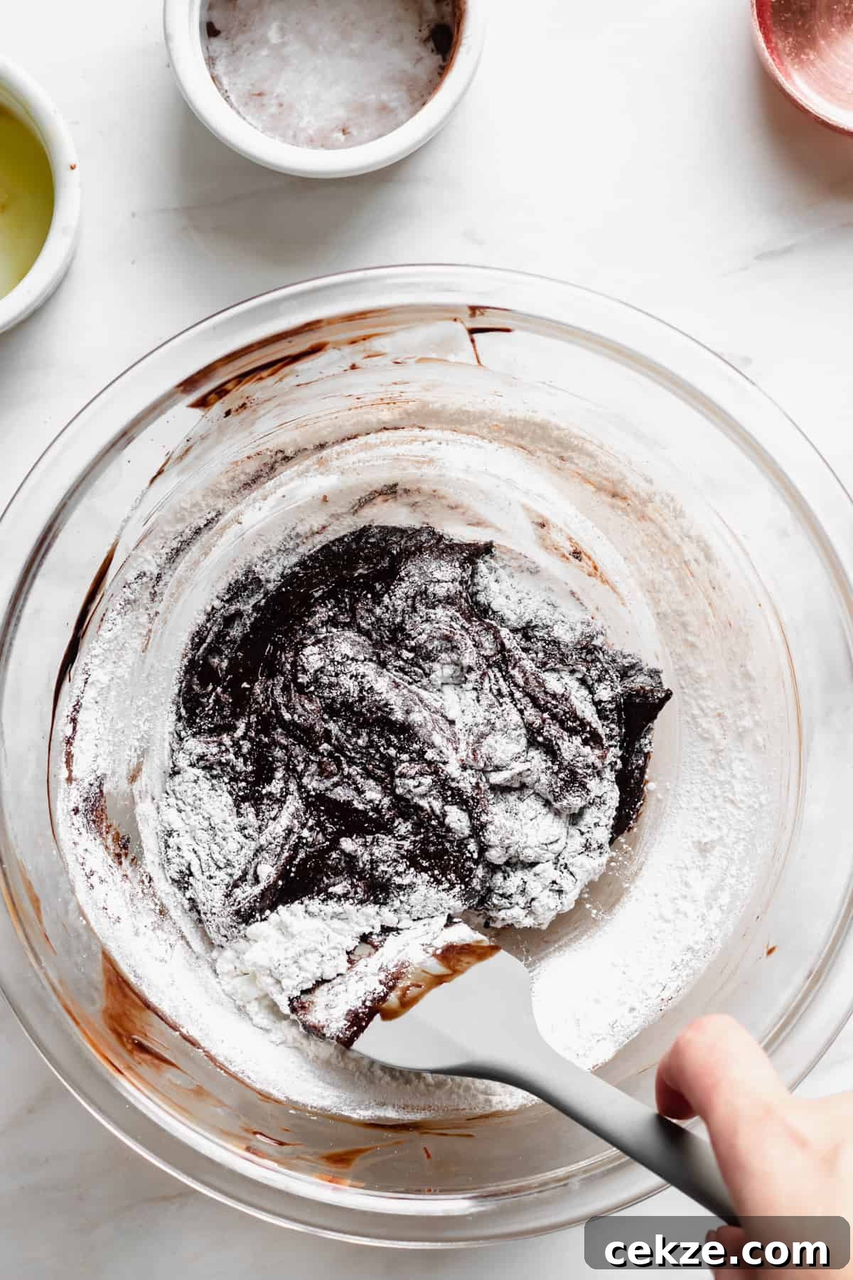 Flour added to the brownie batter