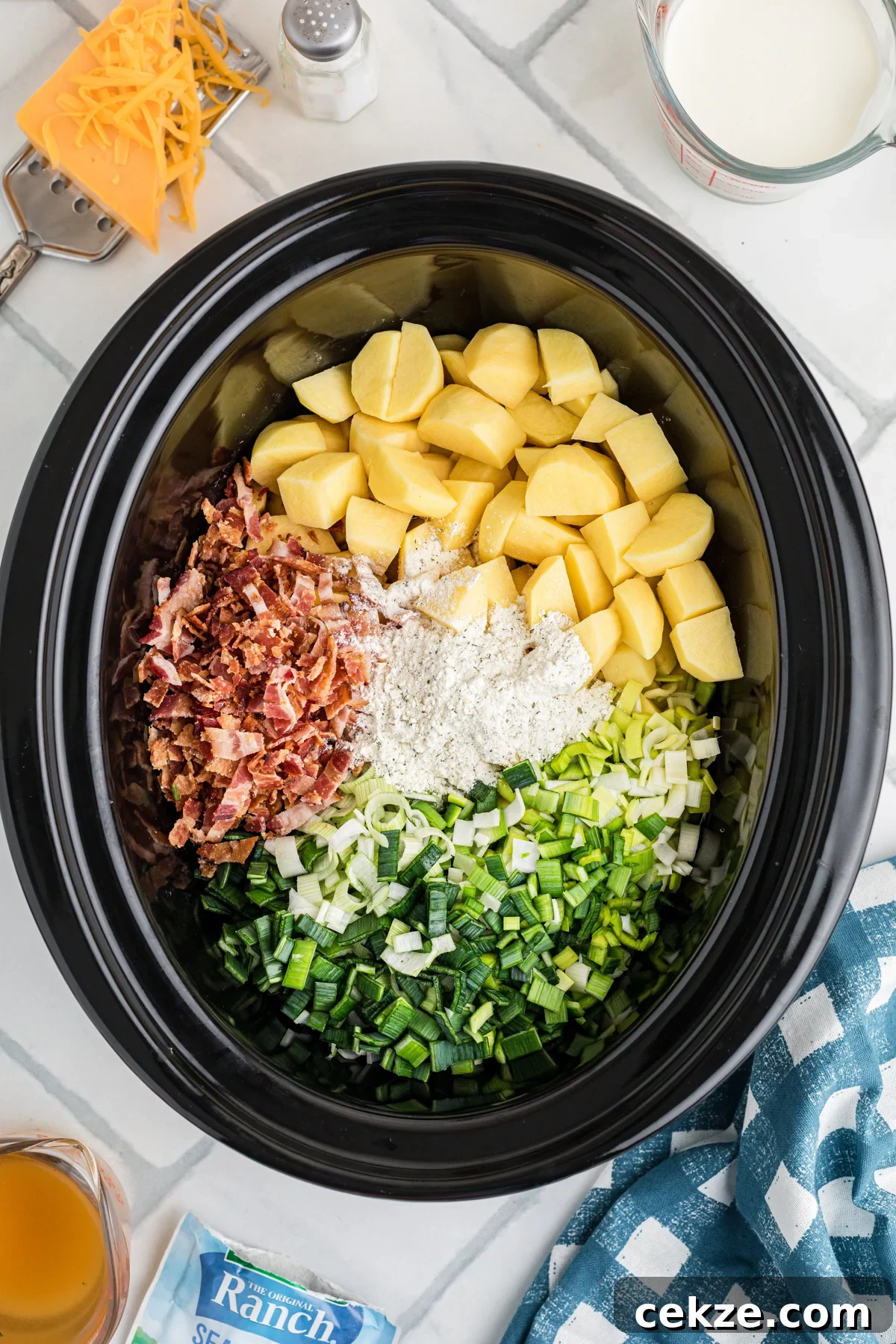 Ingredients for crack potato soup in a crockpot.
