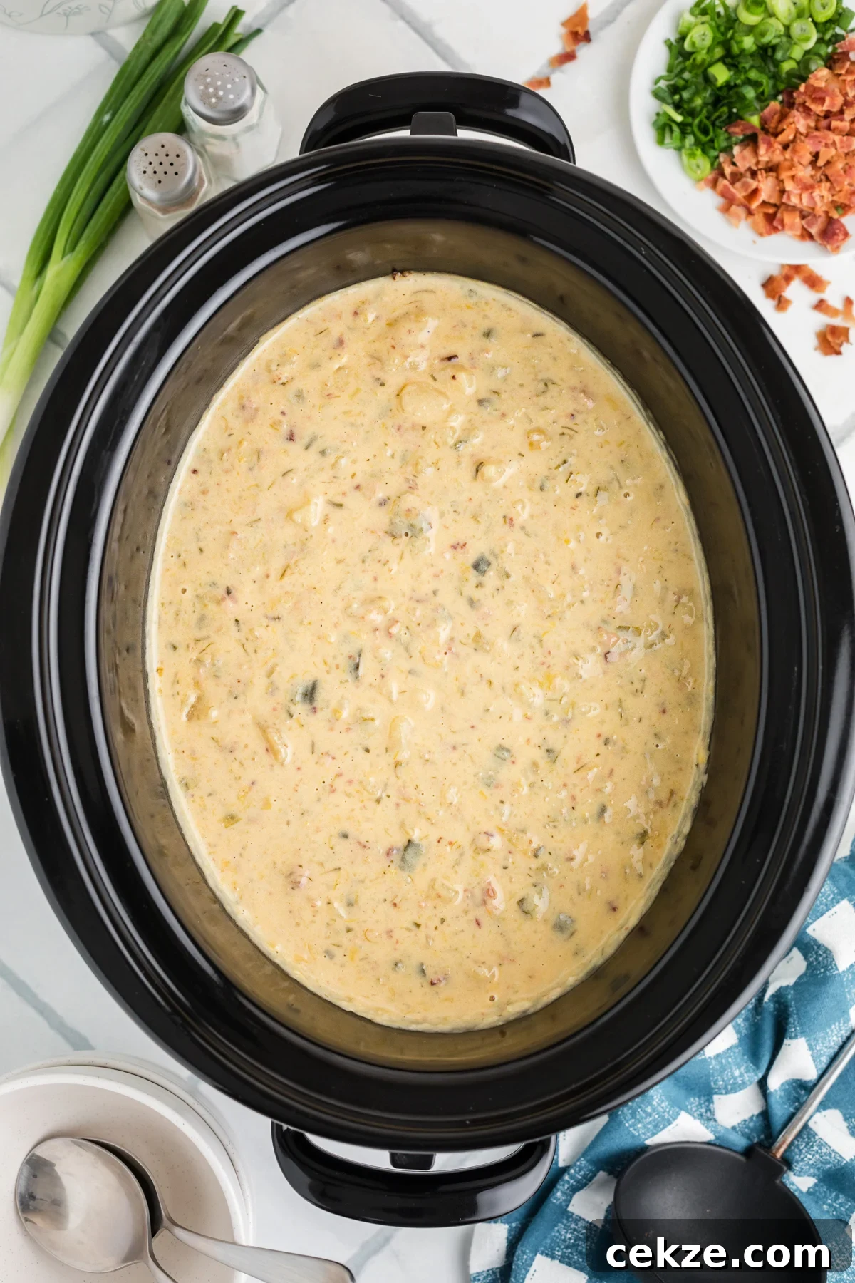Slow cooker bacon ranch potato soup after cooking.