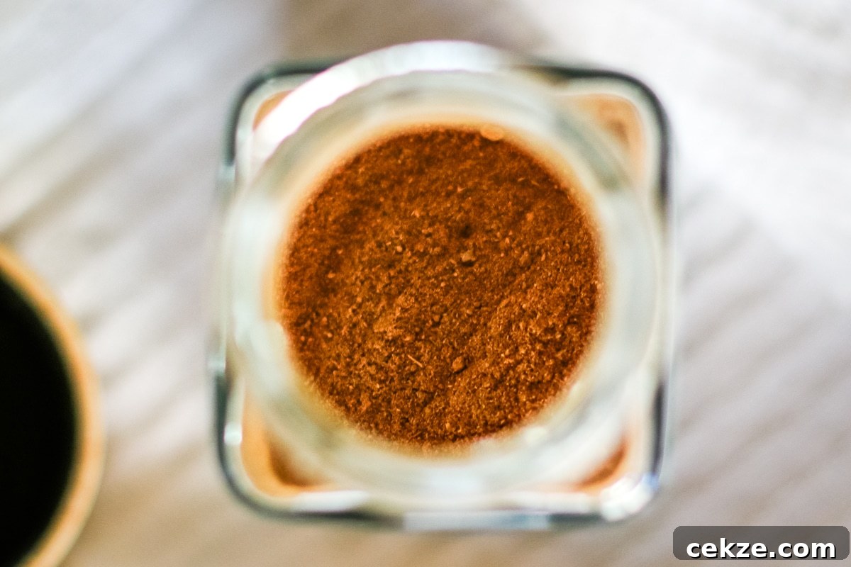 pumpkin pie spice in a spice jar.