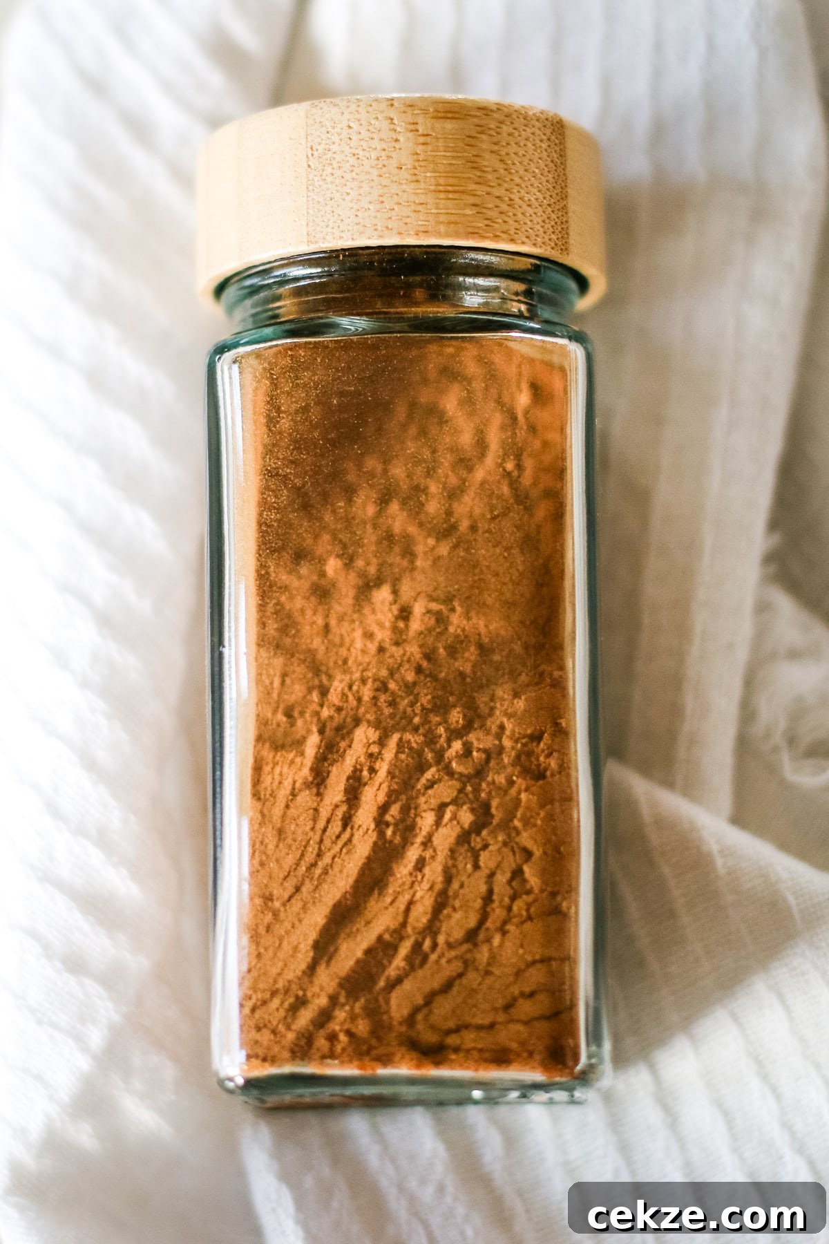 pumpkin pie spice in a spice jar.