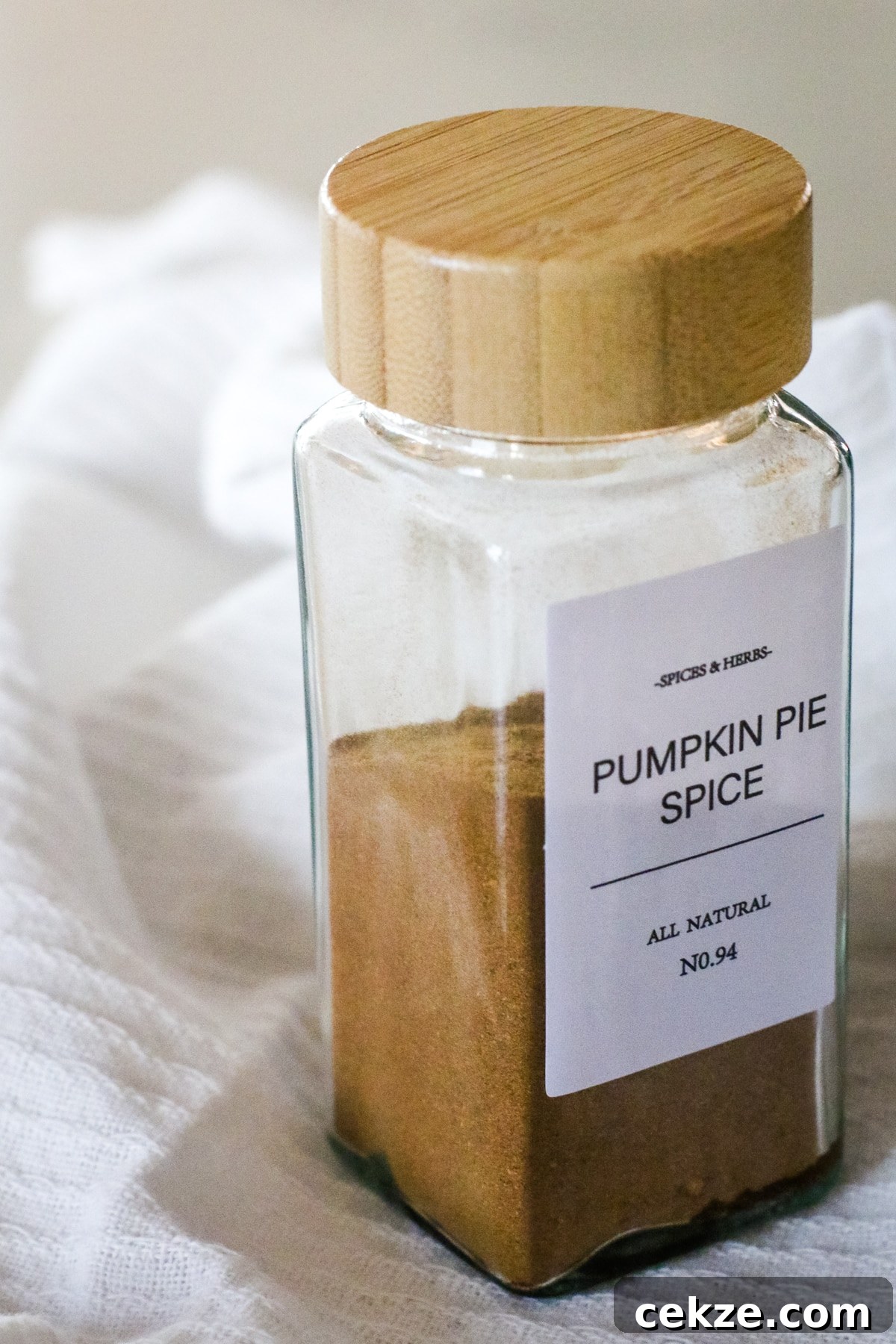 pumpkin pie spice in a spice jar.