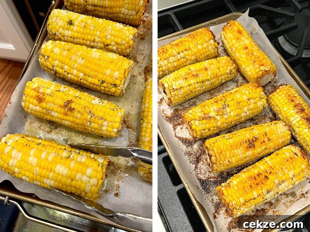 Tongs turning corn cob over on baking pan, pan of baked corn ears.