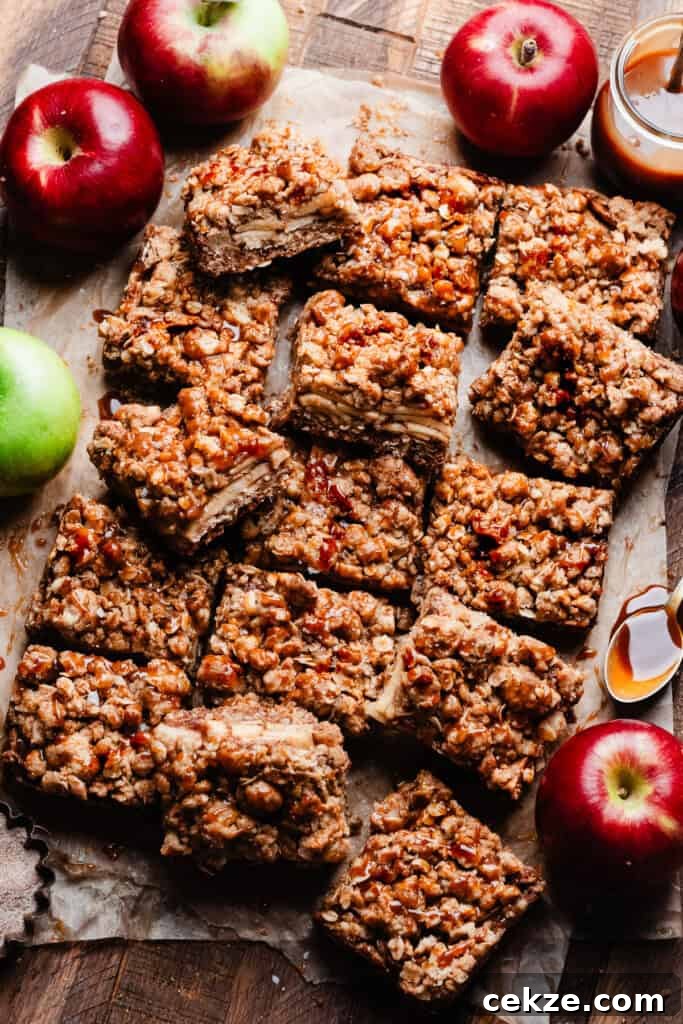 The sliced bars on a wooden surface, drizzled with caramel.