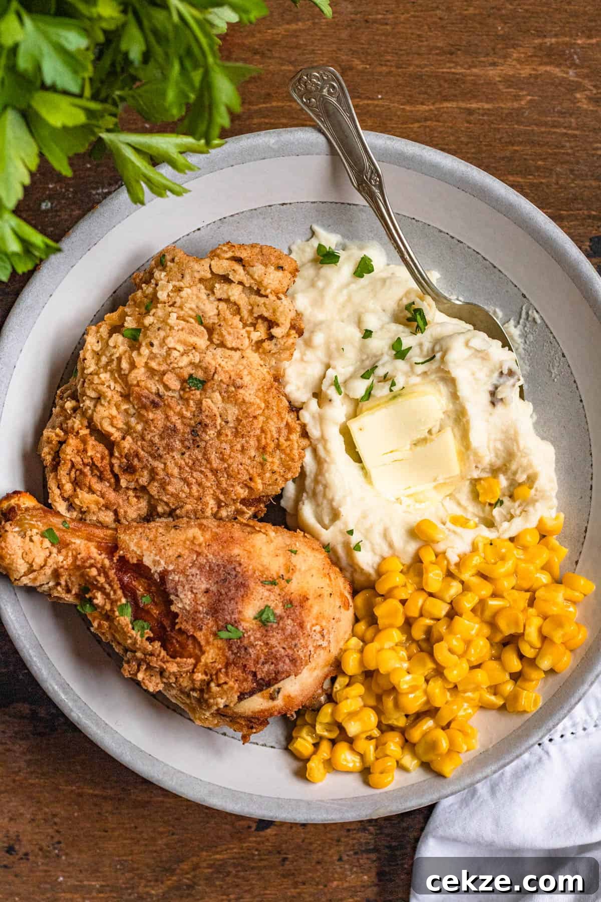 Gluten Free Fried Chicken Recipe on a plate with mashed potatoes
