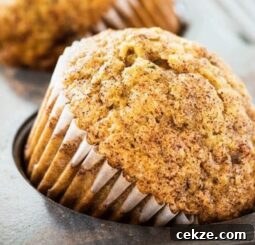 carrot zucchini muffin turned on its side in muffin in